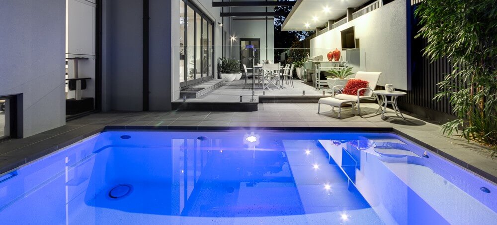 Local Pools and Spas Plunge pool in a compact backyard