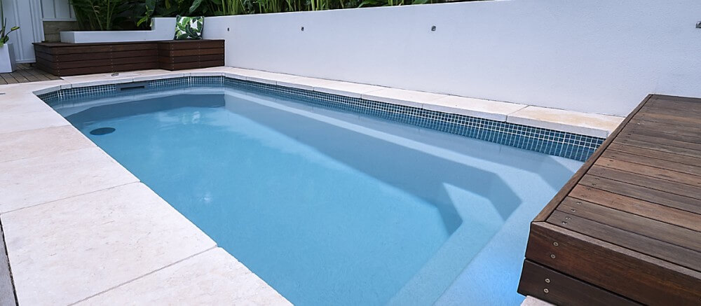 Local Pools and Spas Plunge pool with timber decking on side